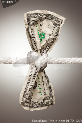 Image of American Dollar Tied in Rope