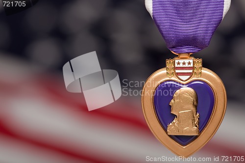 Image of Purple Heart Against American Flag
