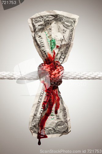 Image of Wrinkled American Dollar Bleeding in Rope