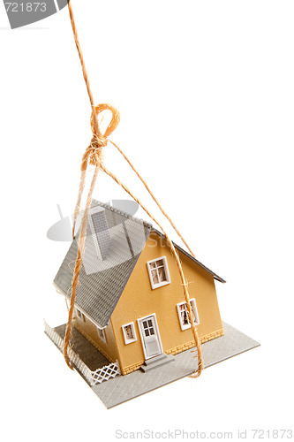 Image of House Hanging by a String