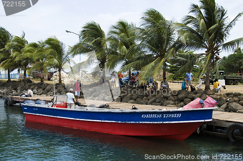 Image of nicaragau native panga boat on dock commuter to little corn isla