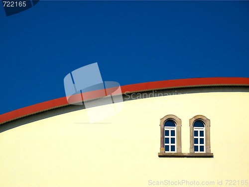 Image of Yellow house and blue sky