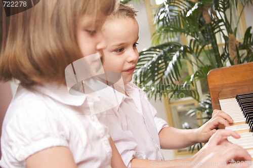 Image of Children Playing the Piano