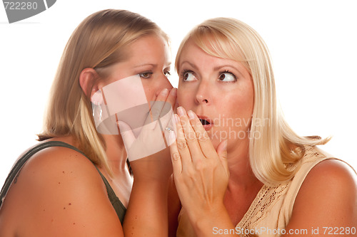 Image of Two Blonde Woman Whispering Secrets