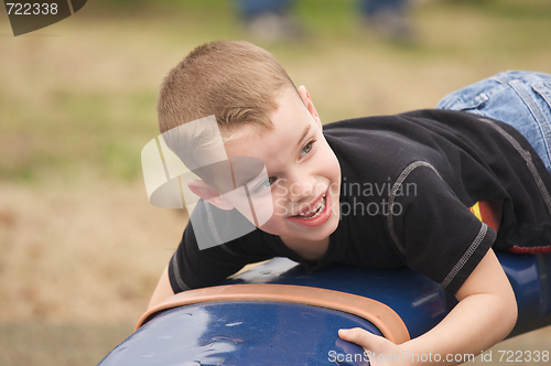 Image of Adorable Child Playing at the Playground