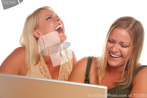 Image of Two Laughing Women Using Laptop