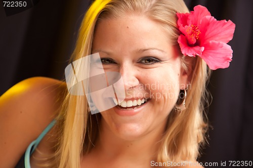 Image of Beautiful Girl with Hibiscus in Her Hair