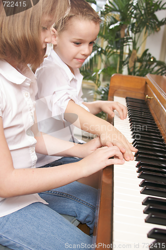 Image of Children Playing the Piano