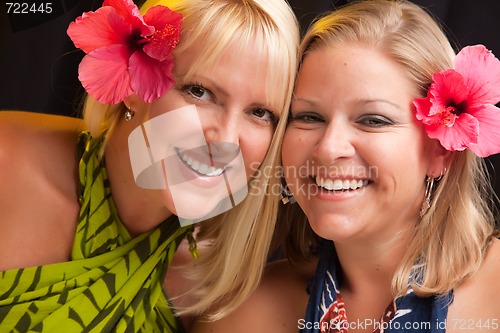 Image of Beautiful Smiling Girls with Hibiscus Flower