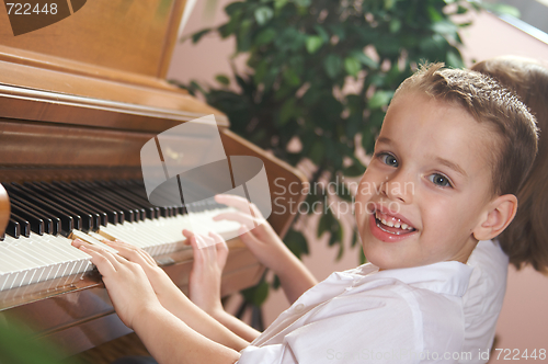 Image of Children Playing the Piano