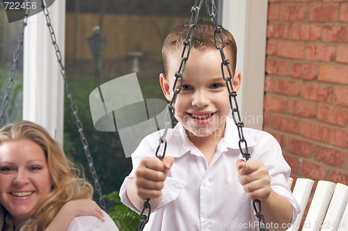 Image of Young Boy Smiles for The Camera