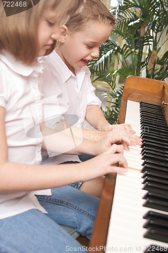 Image of Children Playing the Piano