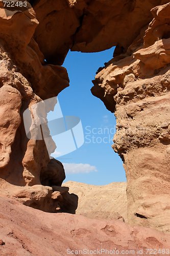 Image of Window in the orange sandstone rock in Negev desert, Israel