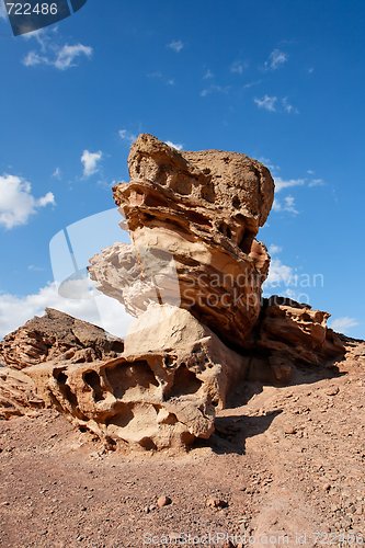 Image of Scenic orange rock in shape of mushroom in stone desert, Israel