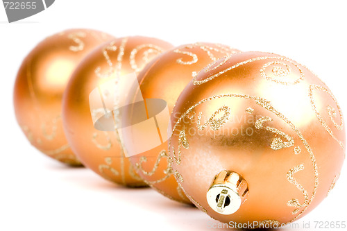 Image of four golden christmas balls