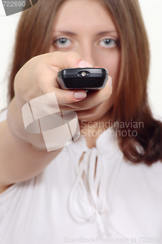 Image of The nice girl with a control panel electronics