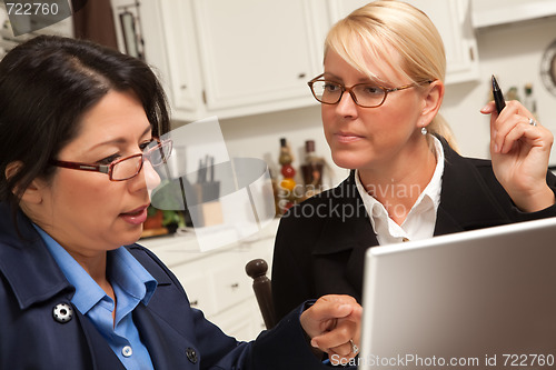 Image of Businesswomen Working on the Laptop