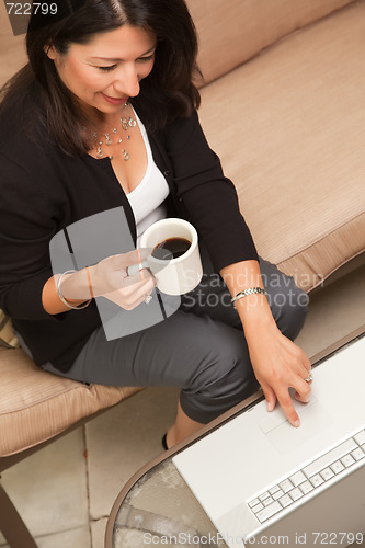 Image of Hispanic Woman with Coffee and Laptop