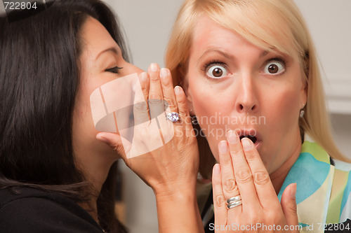 Image of Friends Whispering Secrets