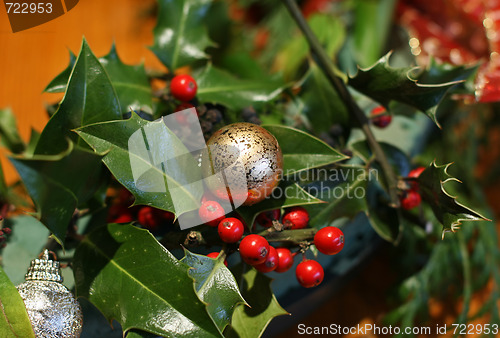 Image of Christmas baubles and holly