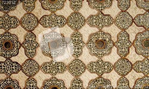 Image of Patterned artwork in the ceiling in Amber Fort palace, India