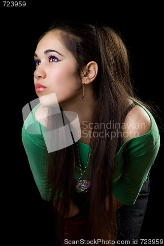 Image of Portrait of the beautiful girl. Isolated on black