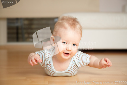 Image of baby on a floor