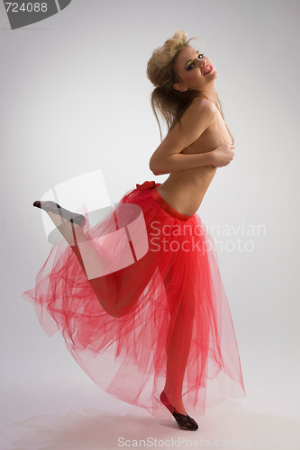 Image of Dancing girl in red skirt