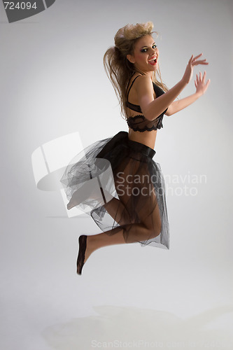 Image of Beautiful girl in diaphanous skirt