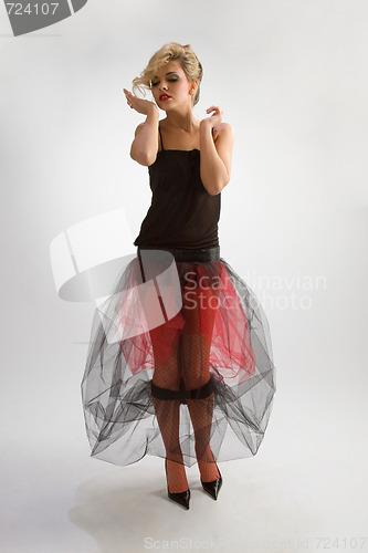 Image of Beautiful girl in diaphanous skirt