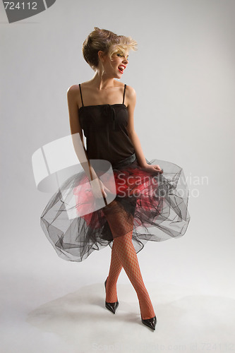 Image of Beautiful girl in diaphanous skirt