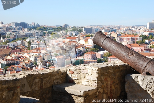 Image of Cityscape of Lisbon in Portugal with cannon weapon