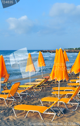 Image of Sunbeds and beach umbrellas