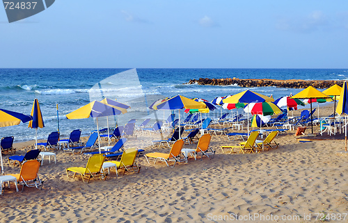 Image of Sunbeds and beach umbrellas