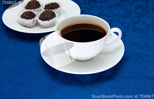 Image of Cup of  coffee on a blue background