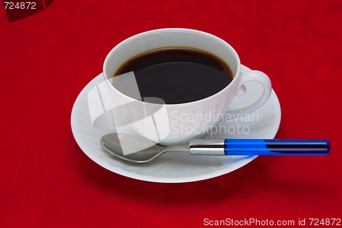Image of Coffee cup over red background