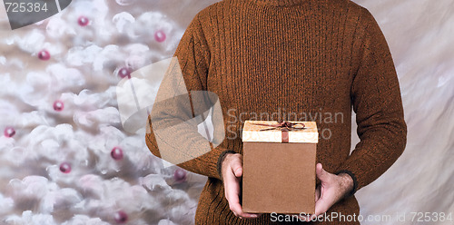 Image of Man Holding Xmas Gift