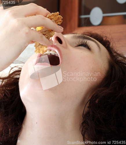 Image of Young people eating milk with cereals