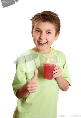 Image of Healthy boy drinking juice thumbs up