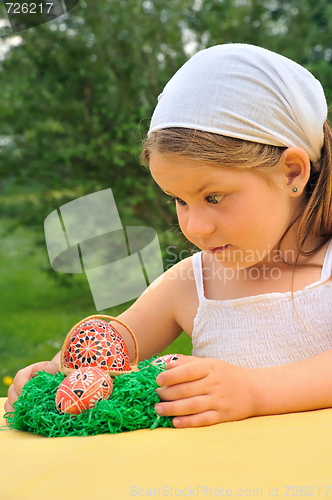 Image of Little girl enjoying Easter time