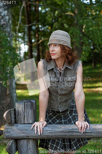 Image of Woman with cap in nature