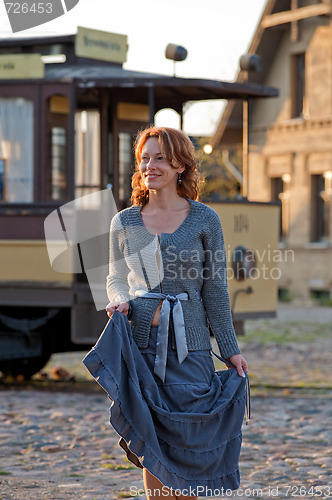 Image of Women and retro tram