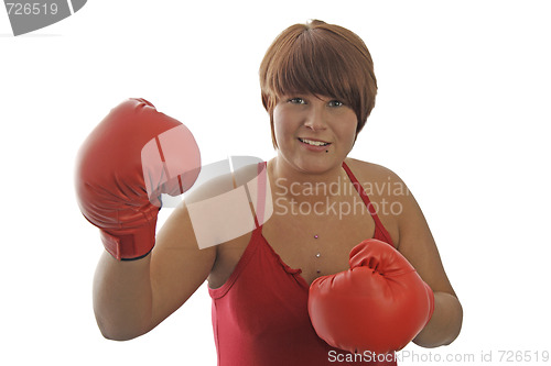 Image of Young woman with boxing gloves