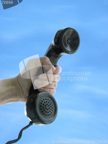 Image of hand and phone