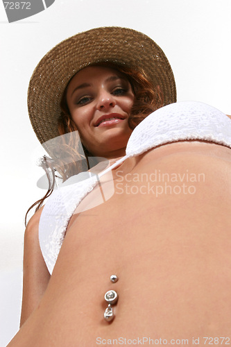 Image of Woman sitting in bikini