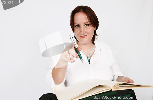 Image of Businesswoman pointing