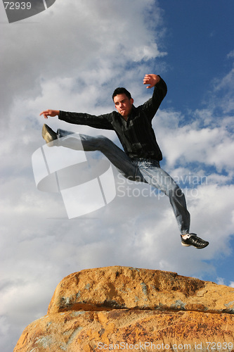 Image of Man jumping of joy