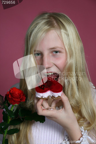 Image of Girl eating a cake