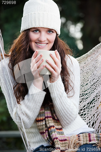 Image of Beautiful teenager drinking coffee