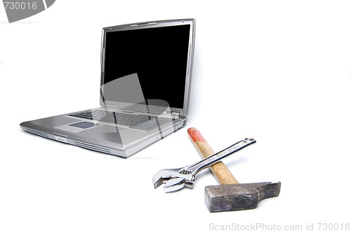 Image of laptop and tools